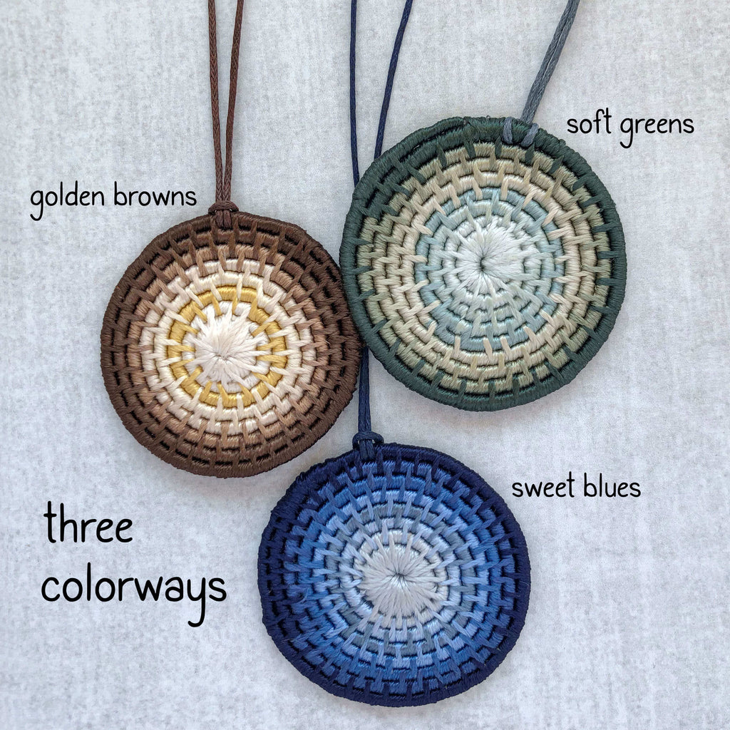 green, blue and brown coiled pendants