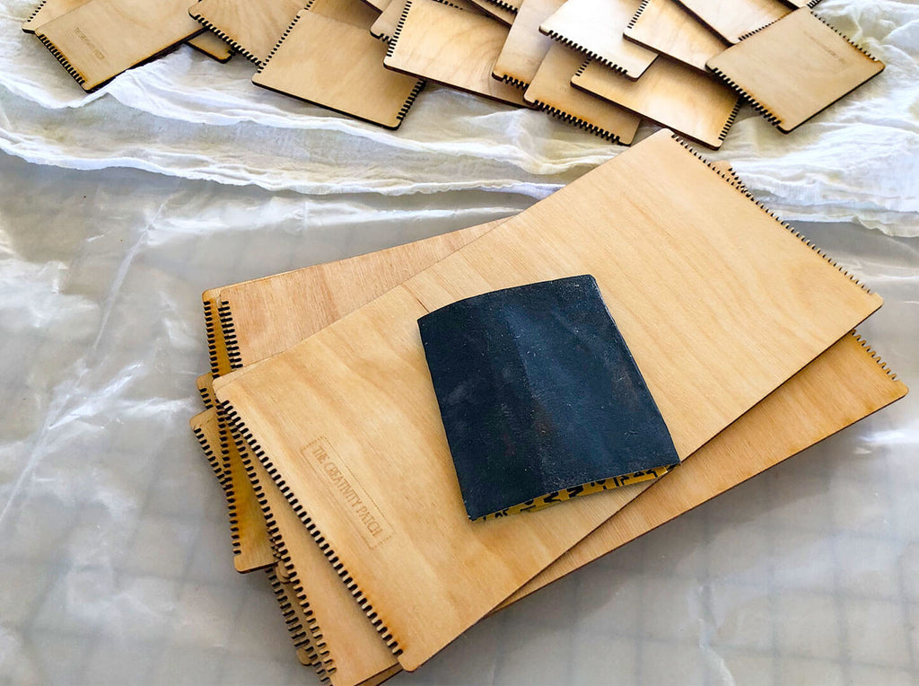 fine sanding little wooden looms