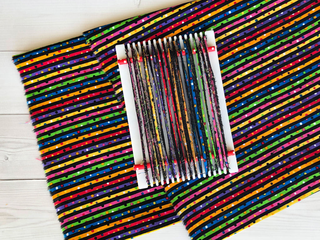 Weaving with Fabric Strips- lom on striped fabric