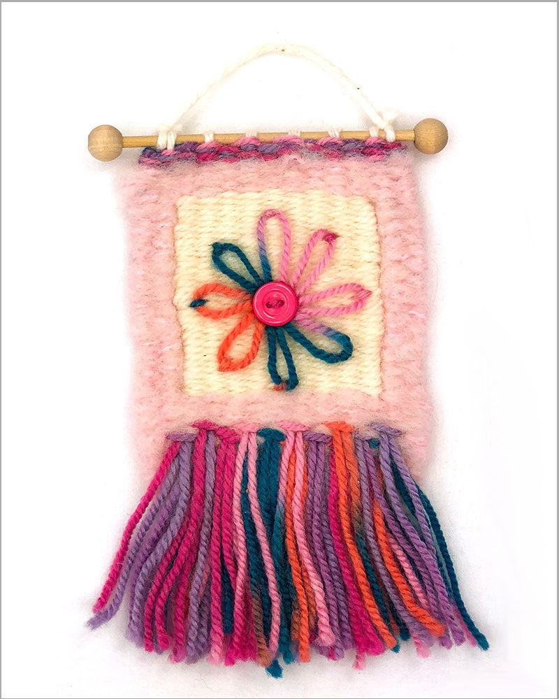 little pink wall hanging using rya knots