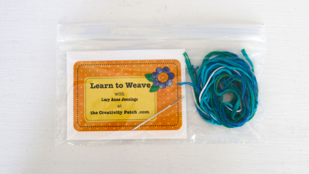 tiny loom in plastic bag