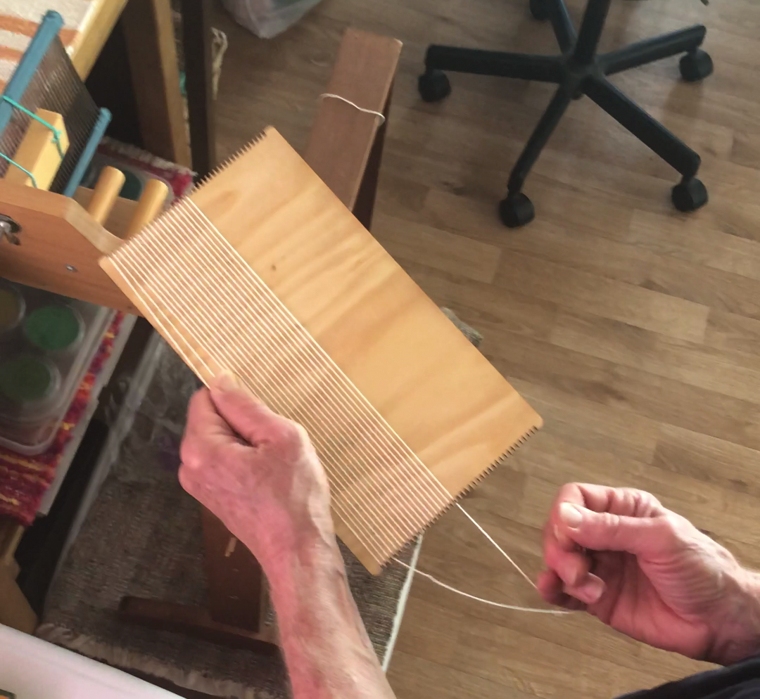 winding warp onto little loom