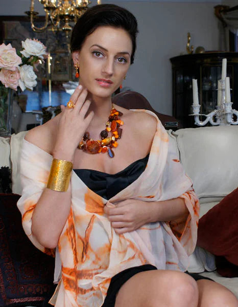 Elegant Female Model Wearing Brazilian Fire Agate Beaded Gemstone Necklace from John S. Brana