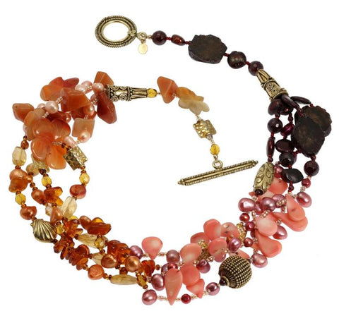A multi-strand Garnet Amber Carnelian Beaded Gemstone Necklace, perfect for adding a touch of warmth and vibrancy to any outfit
