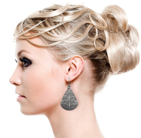 Female Model Wearing Large Damask Embossed Teardrop Earrings