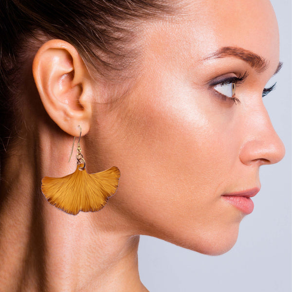 Female Model Wearing Orange Ginkgo Leaf Earrings