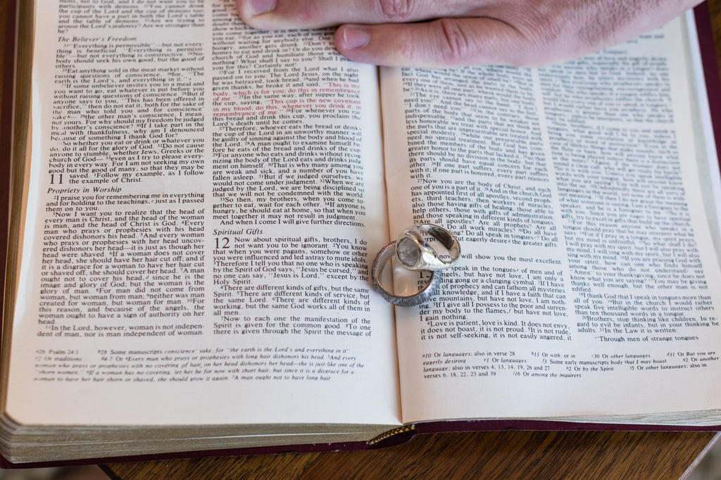 Custom wedding rings on top of bible