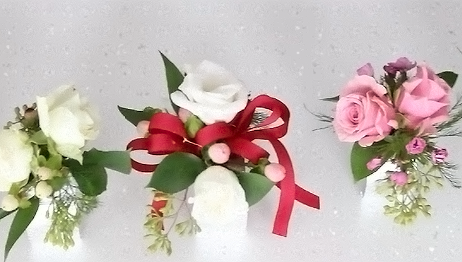 Three finished flower corsages