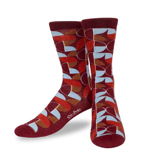 Geometric Pattern Crew Socks on a Burgundy Background