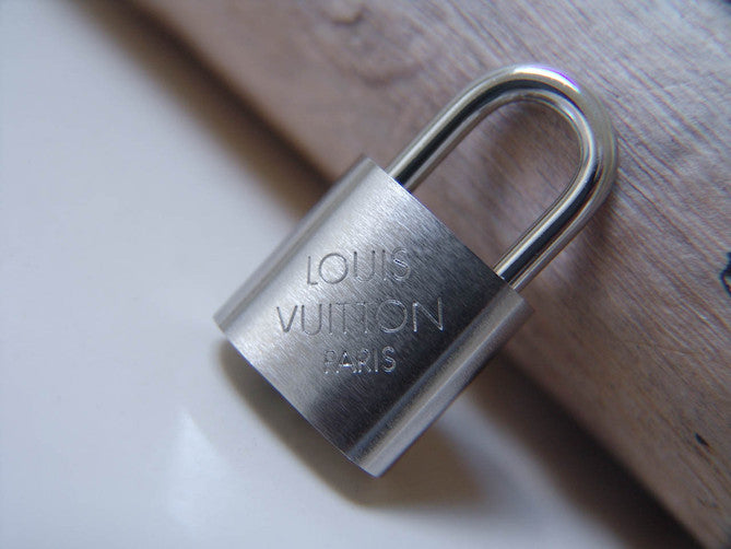Louis Vuitton Padlock Brushed Palladium Number 323 | BNIB – My Haute