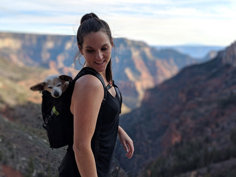 girl with dog backpack