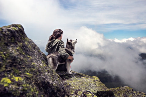 girl siting with dog