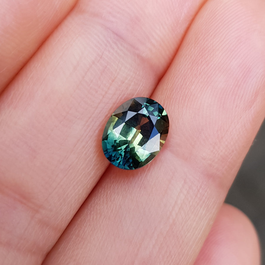 Oval cut Australian Parti Sapphire 2.07ct, by Sydney jeweller Lizunova Fine Jewels, Chifley Square 