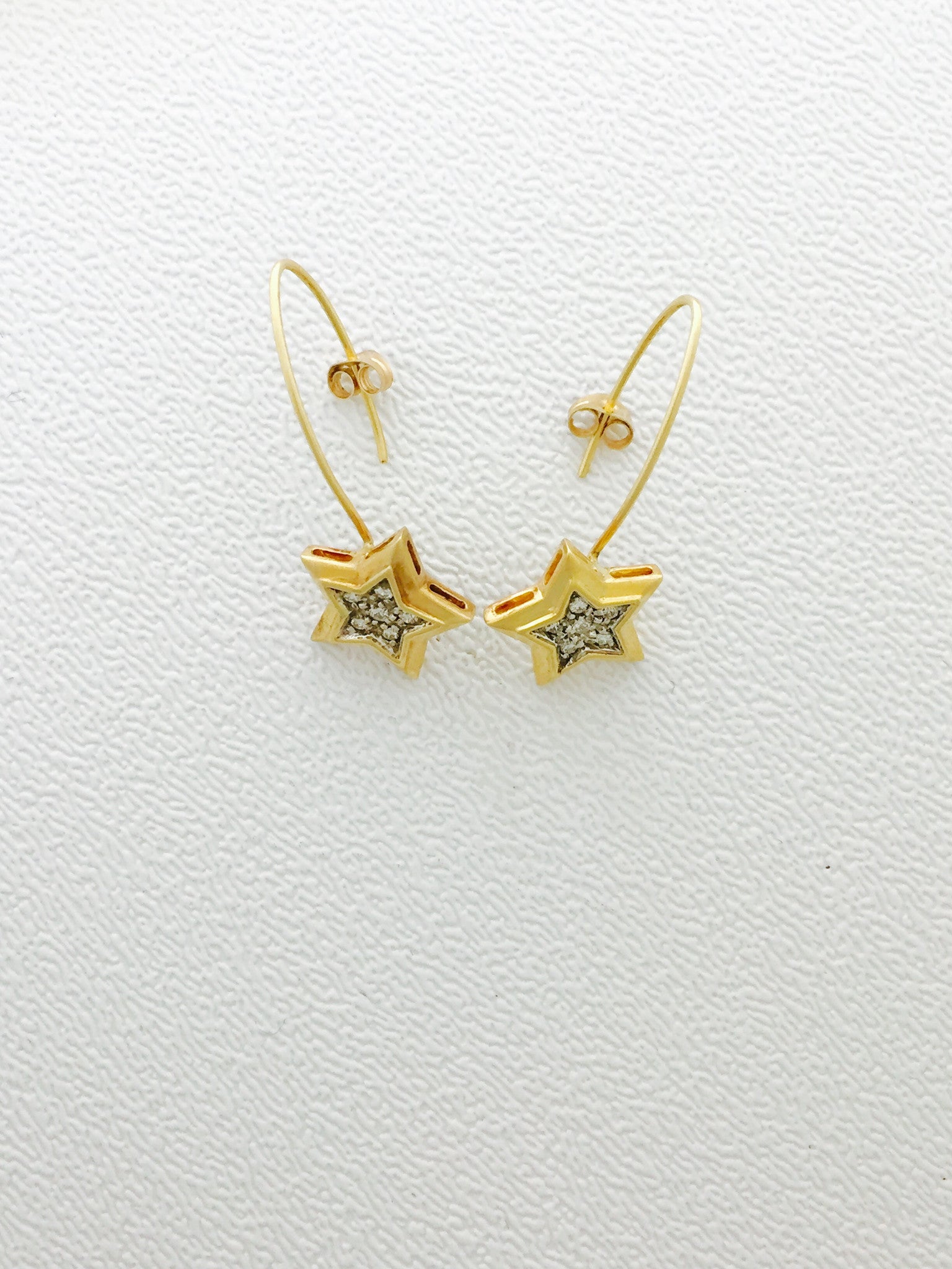 Estate 14K yellow wire star earrings with .12ct of  pave diamonds