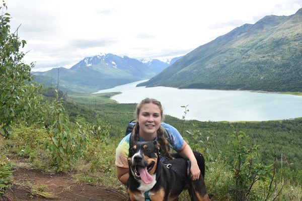 dog and girl hiking