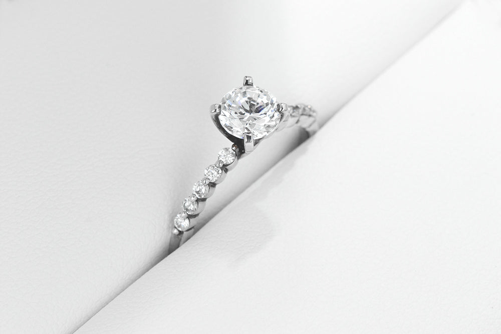 Simple Willow Solitaire Engagement Ring with Diamond Accenting