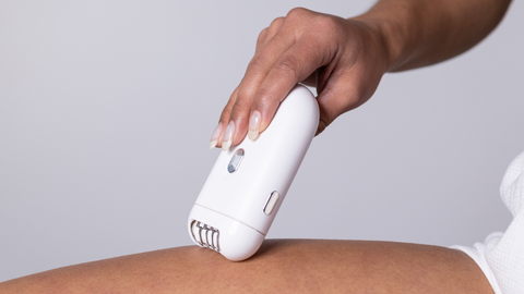 MAGNITONE Pluck It 2 Super Glide Compact Epilator being used on leg