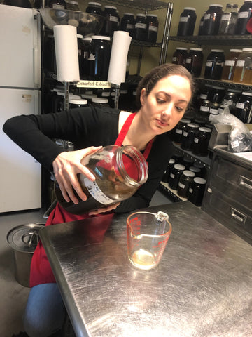 Making and Pouring Herbal Medicine Extracts in Red Moon Herbs Apothecary Lab