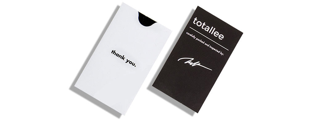 totallee packaging -- "thank you" sleeve and signed warranty card