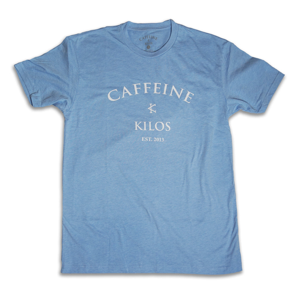 Arch Logo Tee Carolina Blue– Caffeine and Kilos Inc