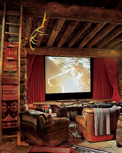 Ralph Laurens Colorado ranch home cinema club chairs exposed beams