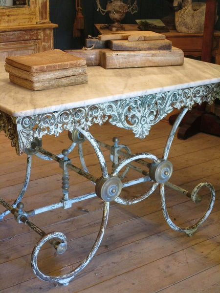 French 19th century marble top butcher's table decorative cast iron base
