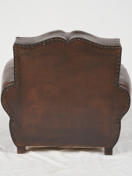 Moustache back French leather club chair