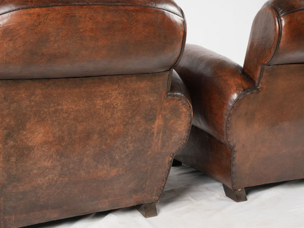 Scroll back vintage French leather club chair
