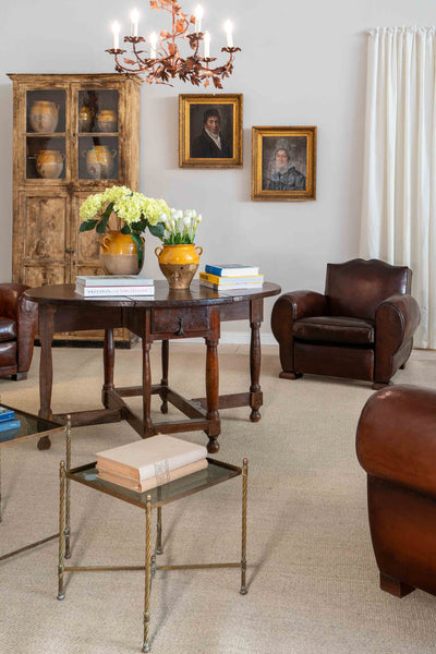 Antique French leather club chairs in reading room