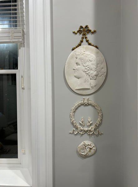 Collection of antique plaster medallions