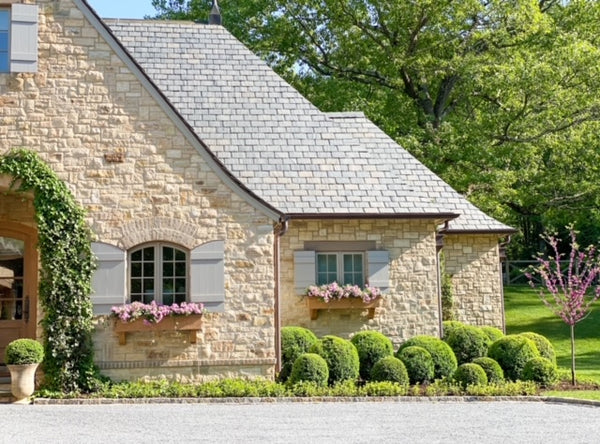 Topiary stone house