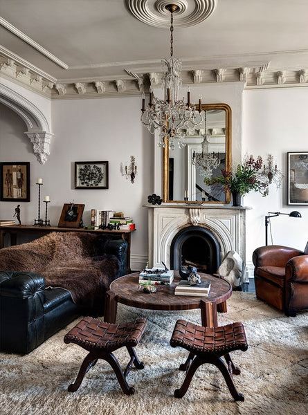 French antiques used in living room with club chair