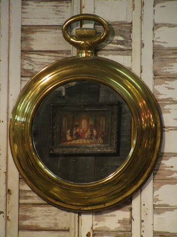 Round vintage mirror from watch shop