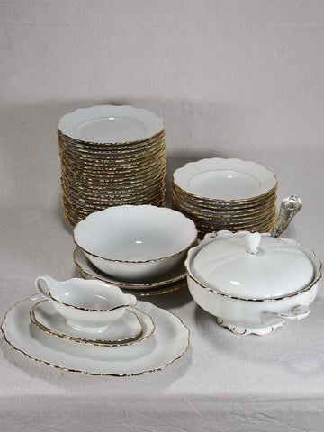 Limoges dinnerware set with gold rim
