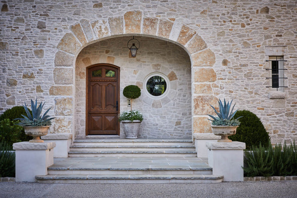 French stone house entry way antique planters