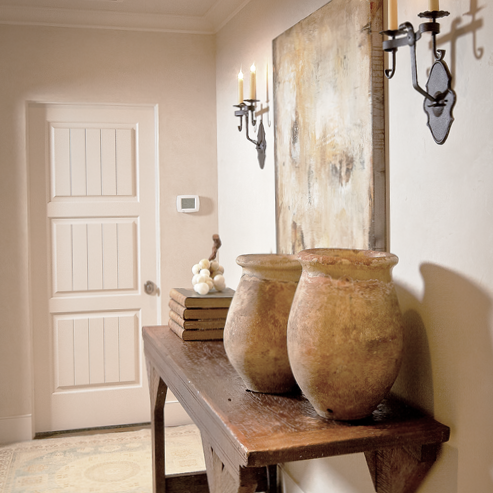 Biot jars on a console table make a lovely entry way hall way