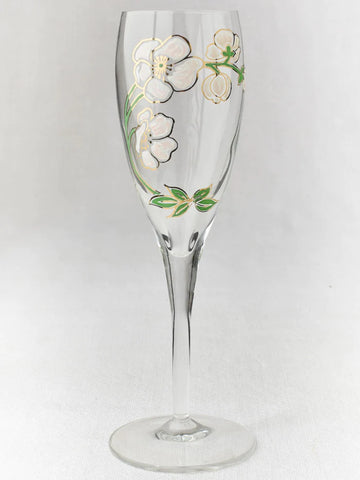 Vintage champagne flutes with blossom