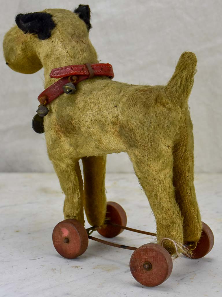 stuffed dog on wheels