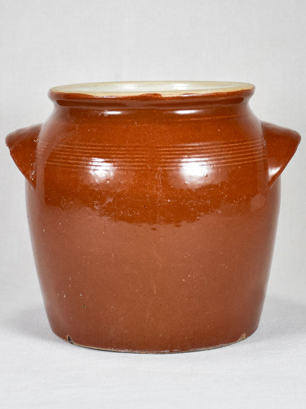 Small brown crock with lid