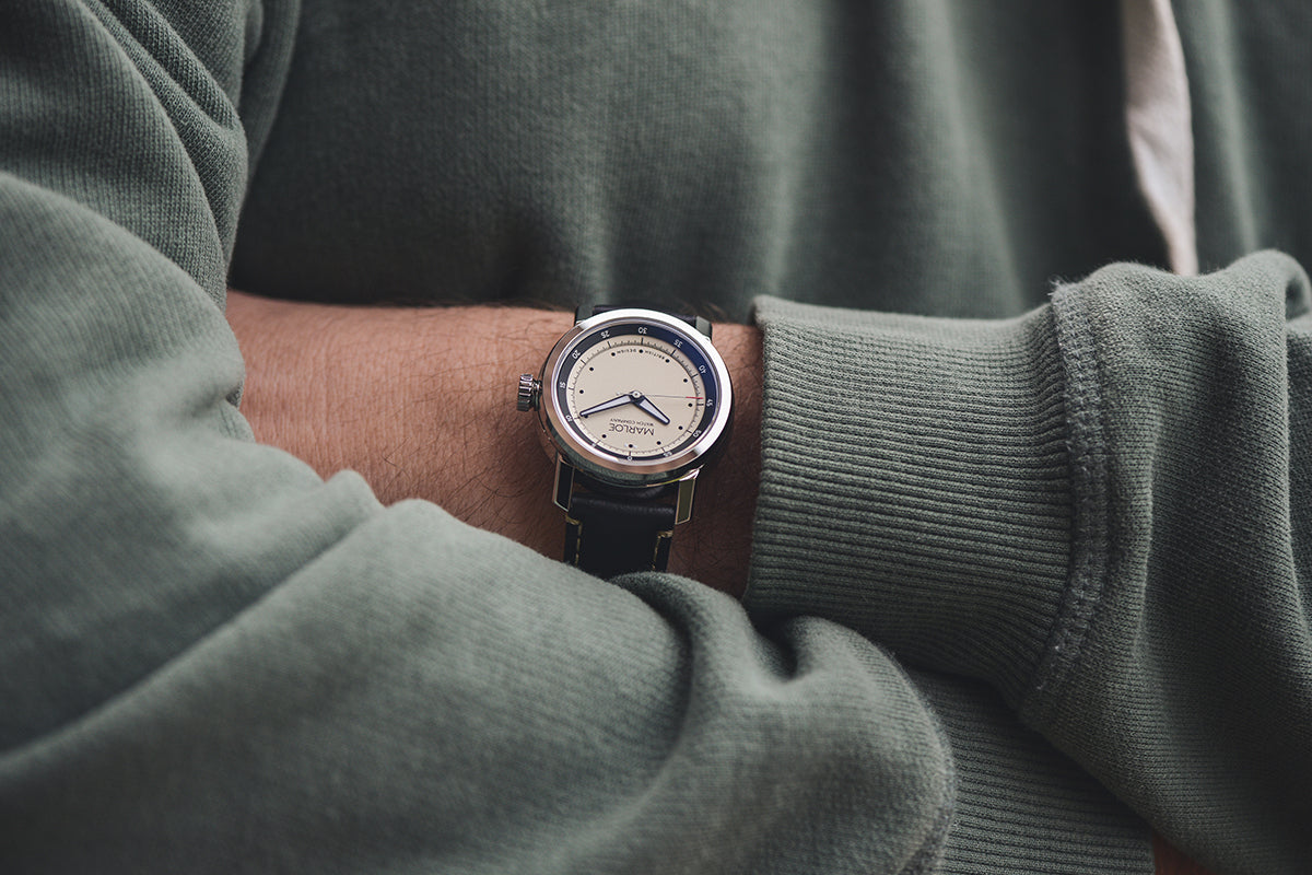 man wearing a mechanical watch made by marloe watch company the tay sail