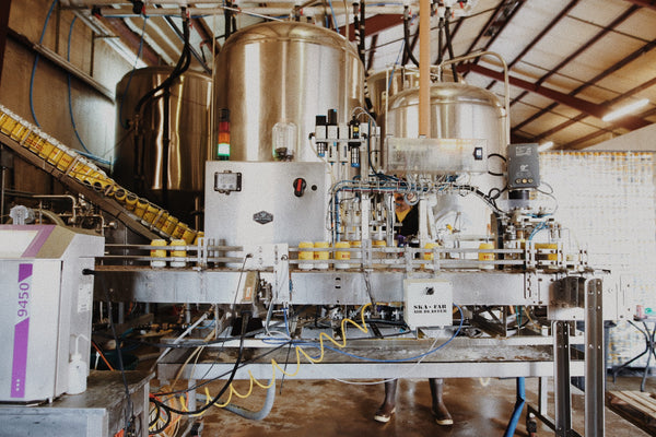 man canning beer