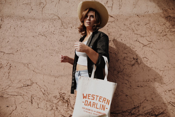 girl carrying tote bag