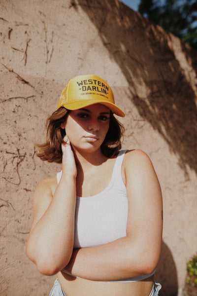 girl in yellow hat