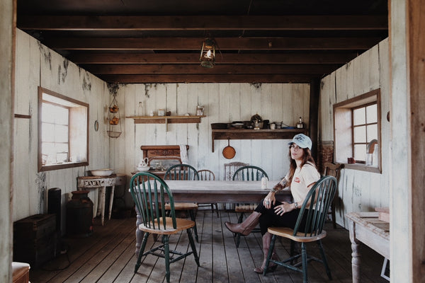 girl sitting at table