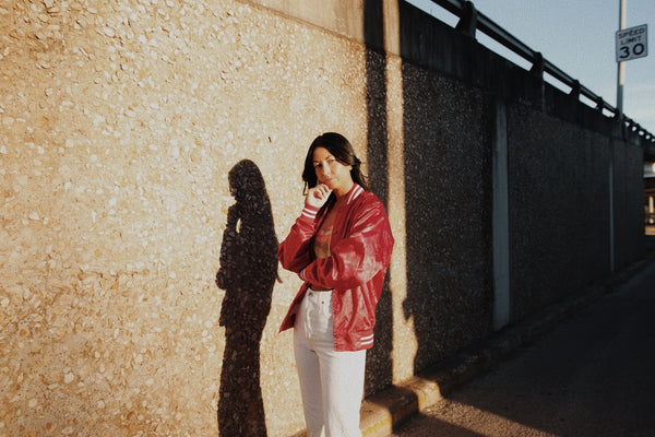 woman standing by bridge