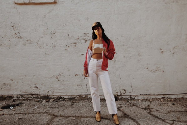 woman standing by wall