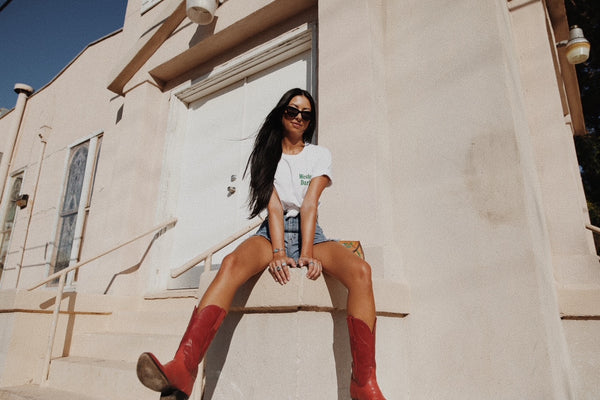 woman sitting on step