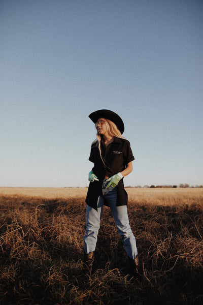 woman standing in field