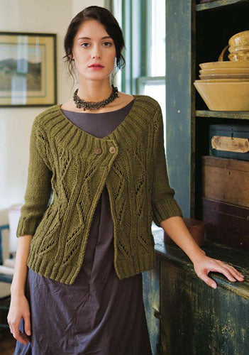 a green Cosima cardigan on a model