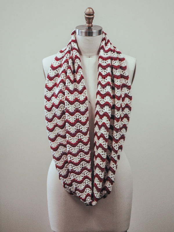 The Penelope cowl knit out of Berroco Ultra Wool DK in the colors Cream 8301, Sunflower 83122, and Heather 83153.